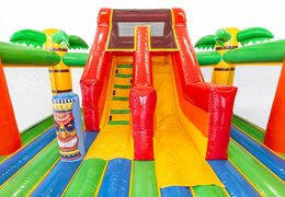 Acquista una castello gonfiabile a tema Hawaii con uno scivolo per bambini. Acquista castelli gonfiabili online su JB Gonfiabili Italia
