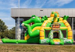 Ordina il castello gonfiabile multigiocatore super gonfiabile con scivolo a tema dinosauro per bambini