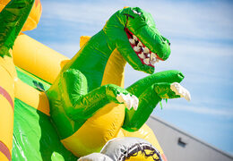 Acquista il tema del super dinosauro multigiocatore del cuscino d'aria con sezione di salto e scivolo per bambini