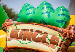 Ordina un cuscino d'aria gonfiabile multigiocatore con tema giungla di elefanti e gorilla per bambini