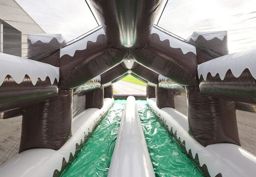 Ottieni un doppio scivolo gonfiabile a tema invernale per grandi e piccini. Acquista ora le attrazioni invernali gonfiabili online su JB Gonfiabili Italia