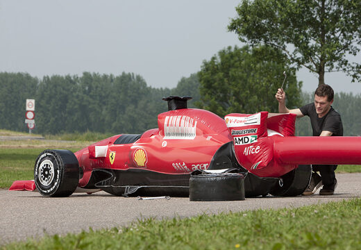 Raceauto band wisselen 