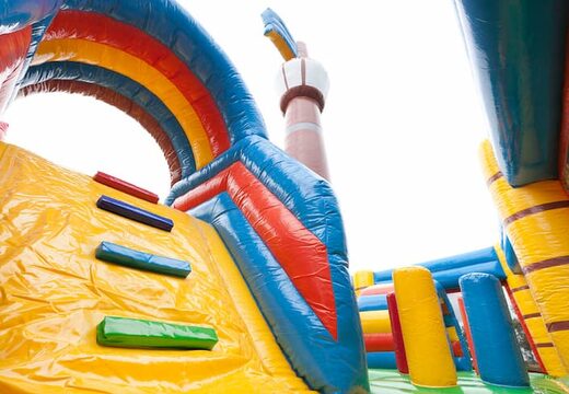 Grande castello gonfiabile multigiocatore per interni con barca dei pirati con scivolo a tema Lego per bambini. Acquista castelli gonfiabili online su JB Gonfiabili Italia