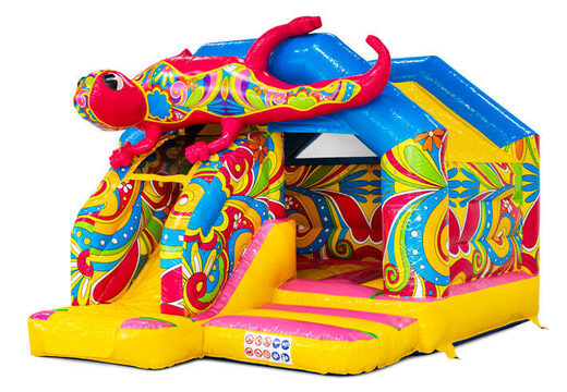 Castello gonfiabile combinato con scivolo con colori giallo, blu, rosa e fiori